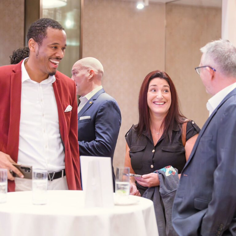 Guests engaged in conversation at The Syndicate Global event at The Connaught, networking among founders, investors, UHNW individuals and family offices.