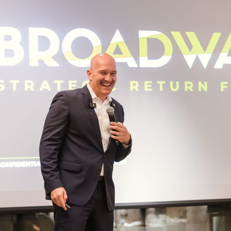 Curt Cronin of the Broadway Strategic Return Fund delivering a speech at The Syndicate Global event at The Connaught, London, engaging UHNW founders, family offices, and business leaders.