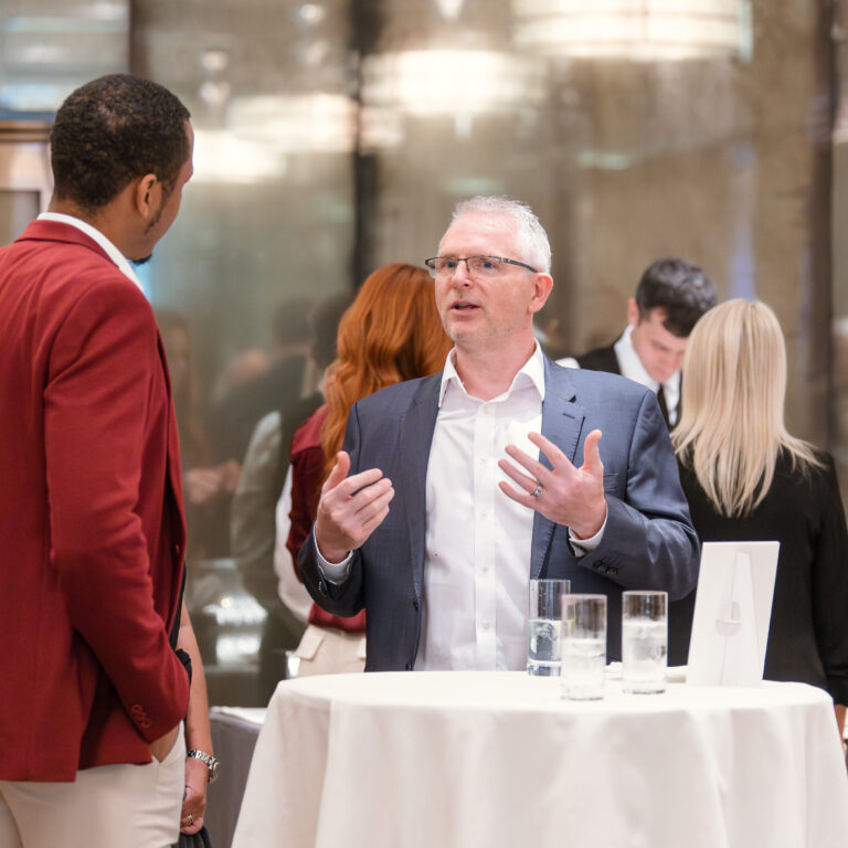 Guests engaged in conversation at The Syndicate Global event at The Connaught, networking among founders, investors, UHNW individuals and family offices.